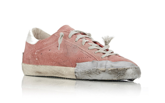 https://footwearnews.com/2016/business/offbeat/golden-goose-pre-distressed-sneaker-controversy-statement-253430/